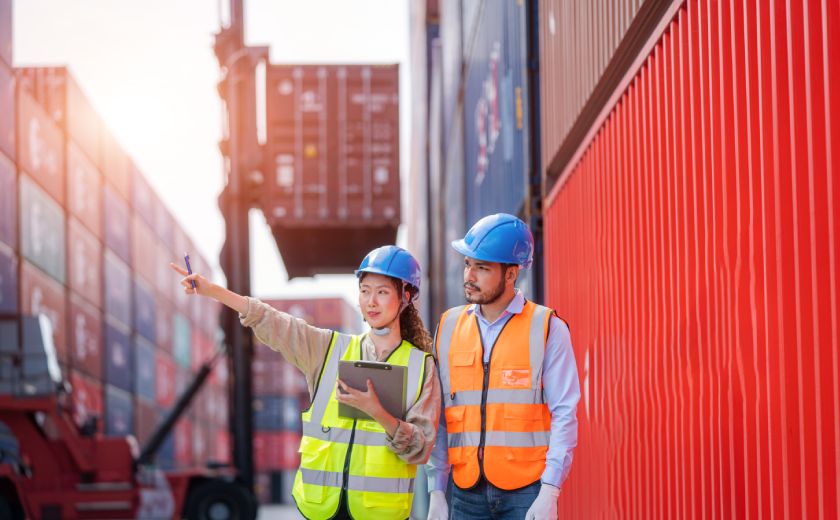 Express Freight man and woman discussing the shipment